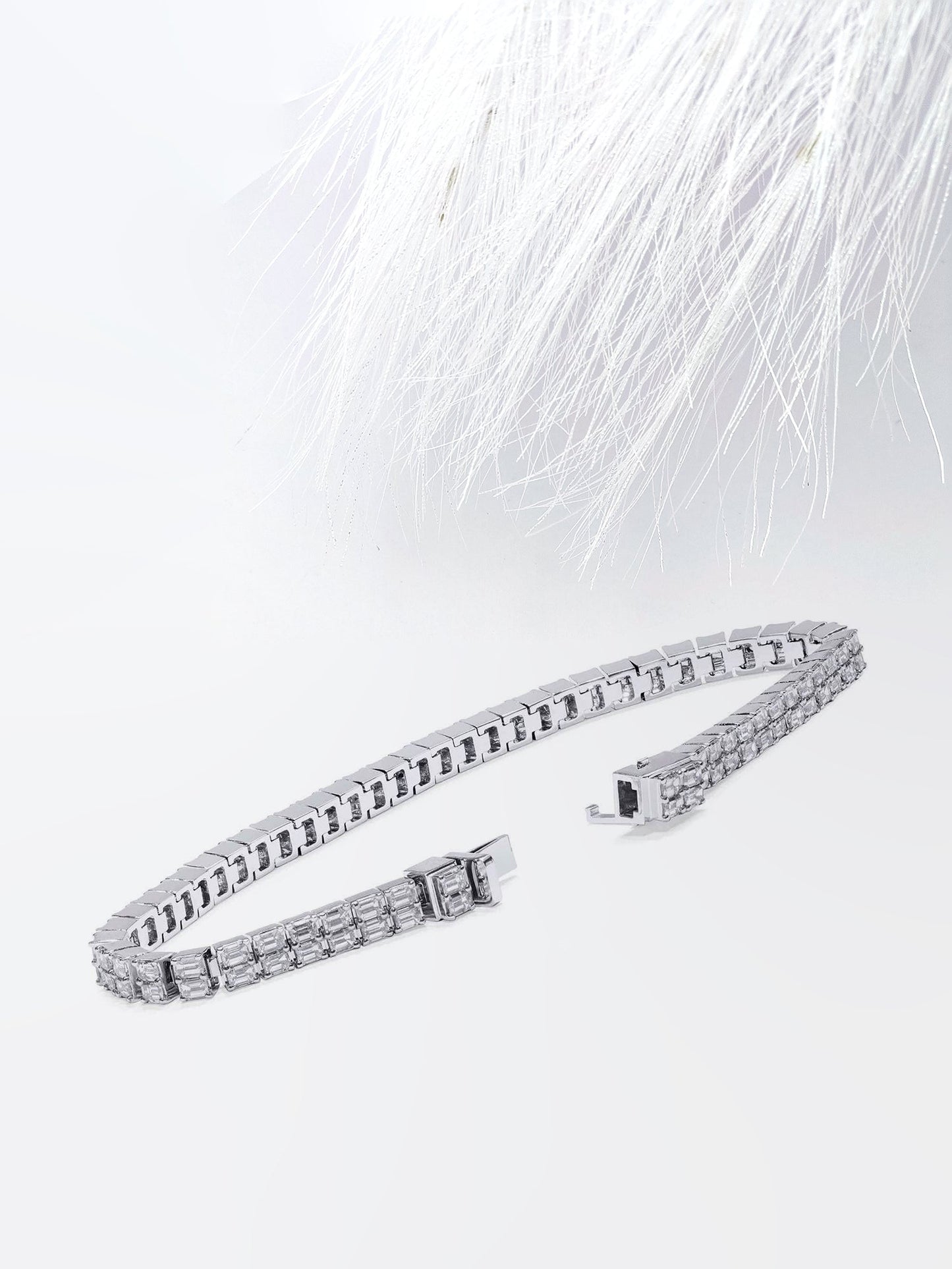 emerald cut moissanite diamond two row tennis bracelet in white gold