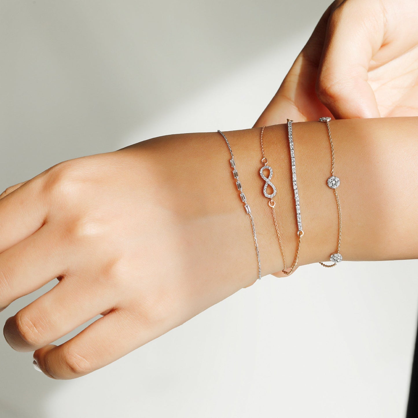 round moissanite diamond line bracelet in solid gold