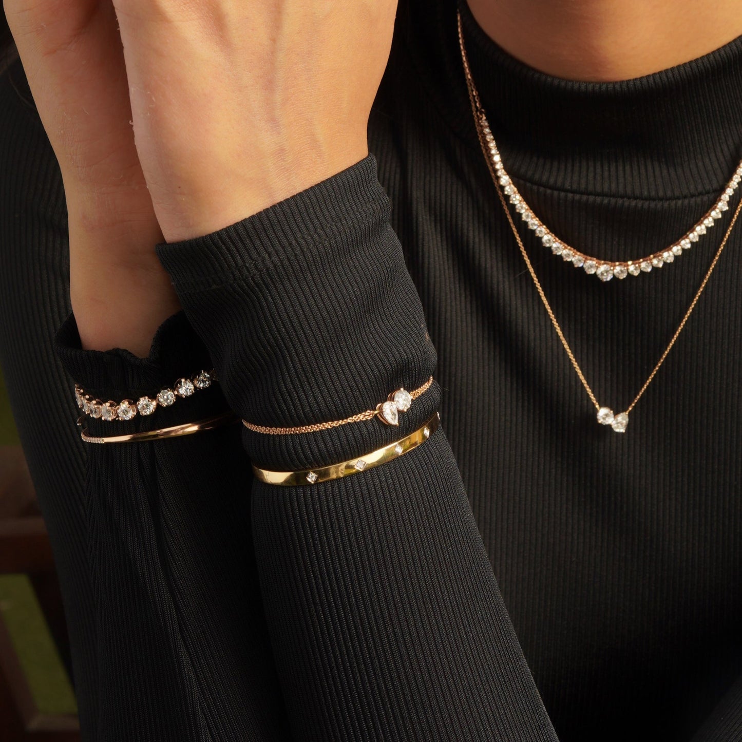 pear & round cut moissanite diamond two stone bracelet in solid gold